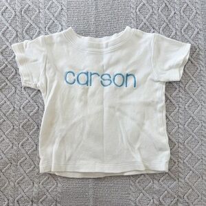 White Baby T-Shirt with Blue Custom Embroidered Name Carson
